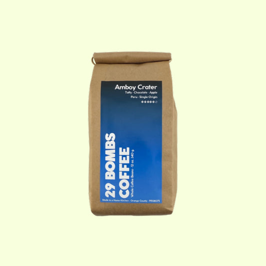 Amboy Crater dark roast Peru coffee beans by 29 Bombs Coffee in the 12 oz bag.